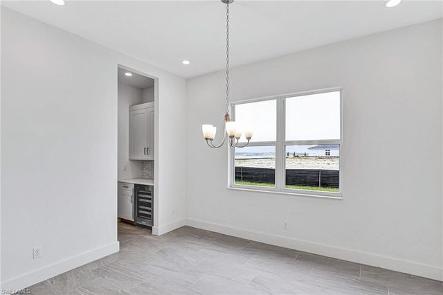 8718 Driftwood DR, Naples, FL 34114