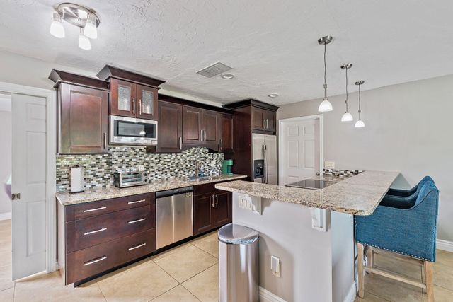 5854 SE Orange Blossom Trail, Hobe Sound, FL 33455