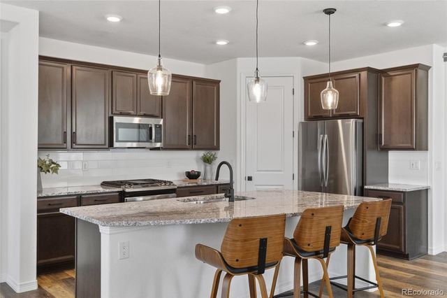 63 Green Fee Circle, Castle Pines, CO 80108