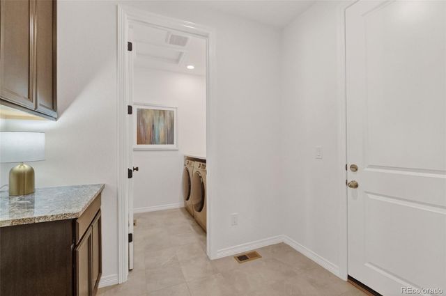 63 Green Fee Circle, Castle Pines, CO 80108