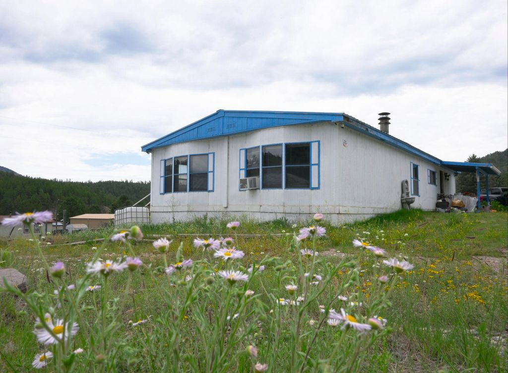 Image 1 of property listing at 20 Needle Place, Jemez Springs, NM 87025