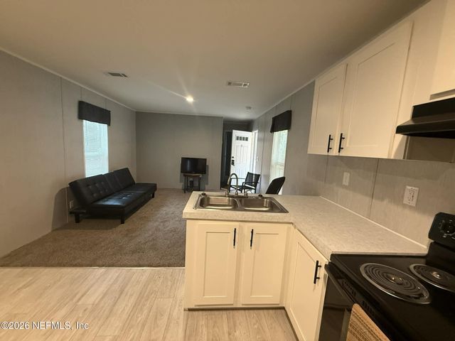 1013 USINA Avenue, Florahome, FL 32140