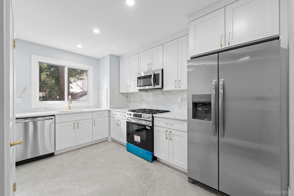 10928 143rd Street, Jamaica, NY 11435 — photo 3