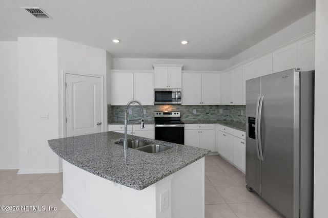 50 REDBUD Road, Palm Coast, FL 32137