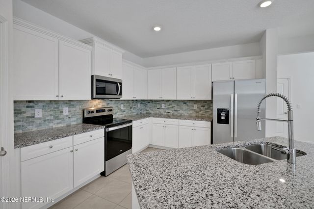 50 REDBUD Road, Palm Coast, FL 32137