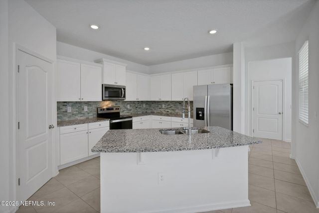 50 REDBUD Road, Palm Coast, FL 32137