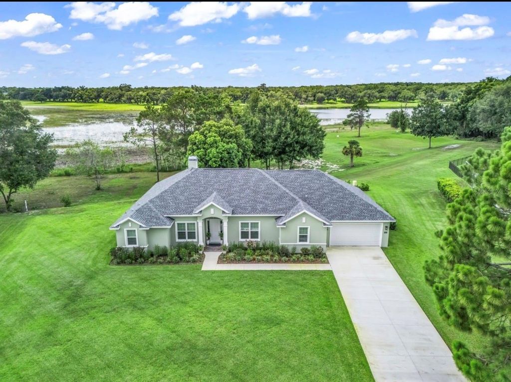 Image 1 of property listing at 3828 OAK POINTE DRIVE, Lady Lake, FL 32159
