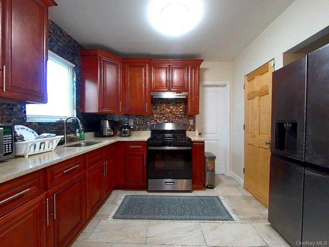 9915 202nd Street, Hollis, NY 11423