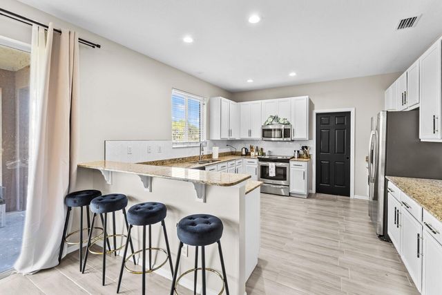 6909 NW Kowal Court, Port St Lucie, FL 34986