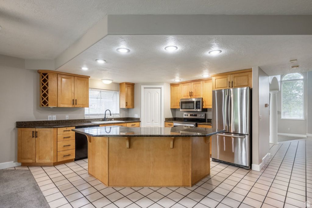 5852 S JORDAN CANAL RD, Taylorsville, UT 84129 — photo 2