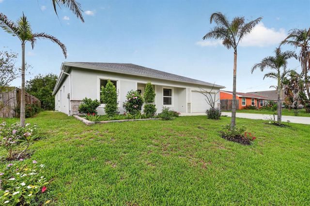1974 SW Idaho Lane, Port St. Lucie, FL 34953