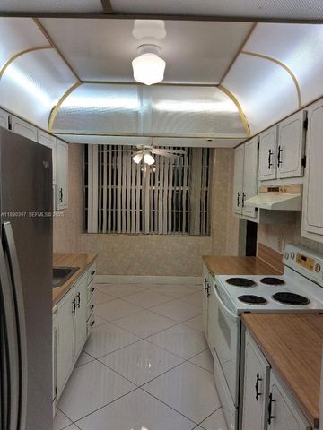 1300 St Charles Place 319, Pembroke Pines, FL 33026