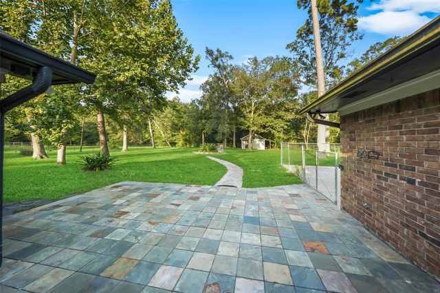 83 County Road 3189c, Cleveland, TX 77327