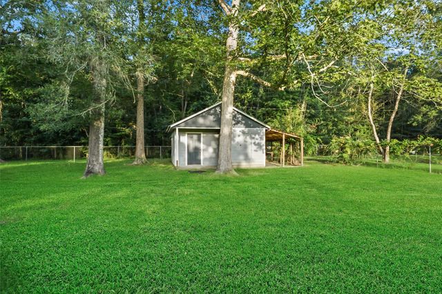 83 County Road 3189c, Cleveland, TX 77327