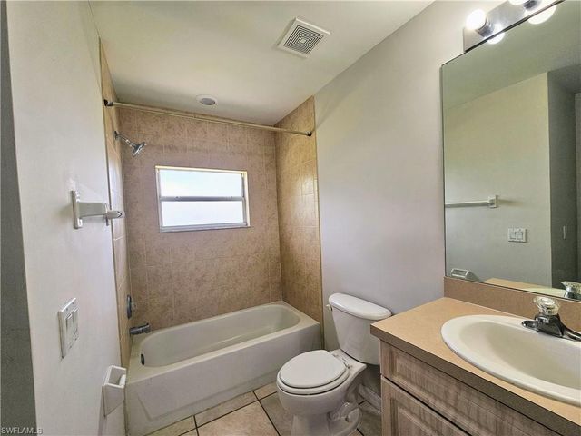 124 Ivan AVE S, Lehigh Acres, FL 33973