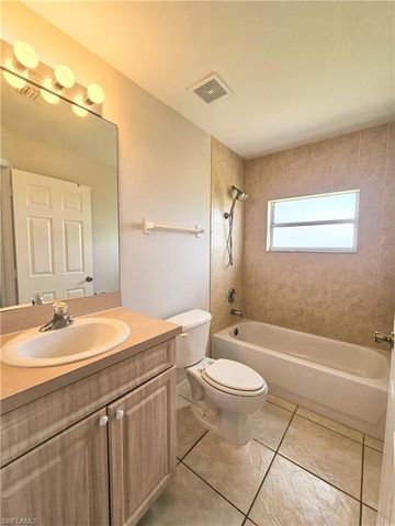 124 Ivan AVE S, Lehigh Acres, FL 33973