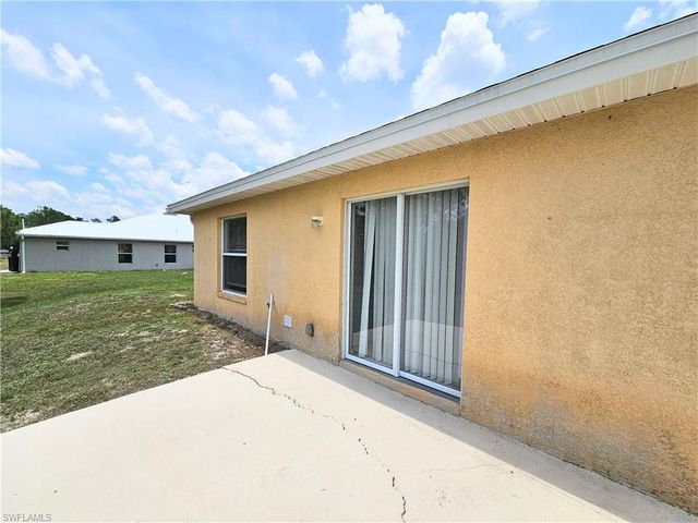 124 Ivan AVE S, Lehigh Acres, FL 33973