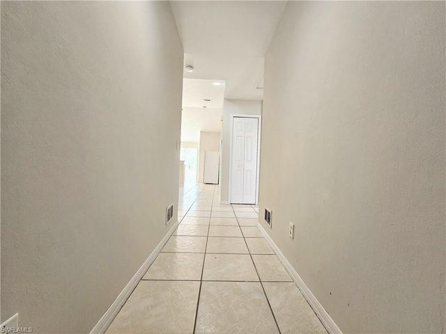 124 Ivan AVE S, Lehigh Acres, FL 33973