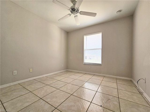 124 Ivan AVE S, Lehigh Acres, FL 33973