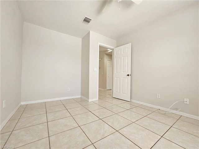 124 Ivan AVE S, Lehigh Acres, FL 33973