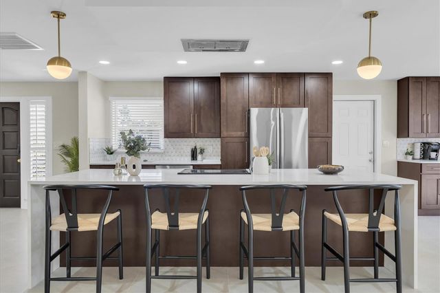 10100 PARADISE BOULEVARD, Treasure Island, FL 33706