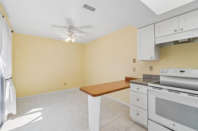 1130 ORANGE TREE CIRCLE W C, Palm Harbor, FL 34684