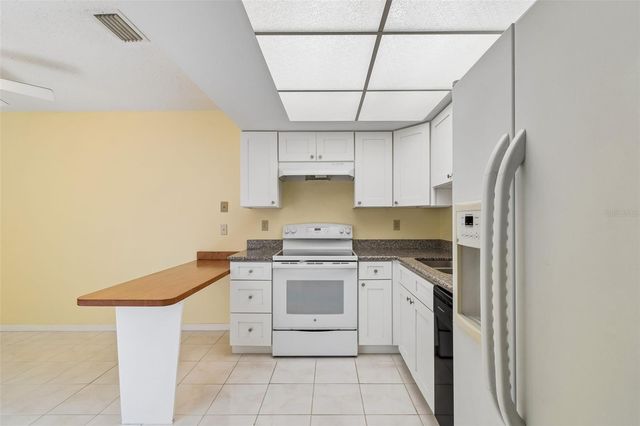 1130 ORANGE TREE CIRCLE W C, Palm Harbor, FL 34684