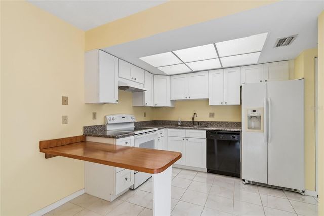 1130 ORANGE TREE CIRCLE W C, Palm Harbor, FL 34684