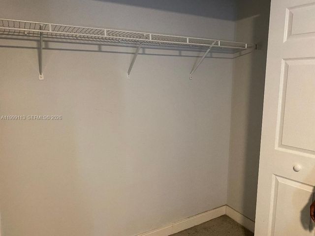 7690 S Southwood Cir, Davie, FL 33328