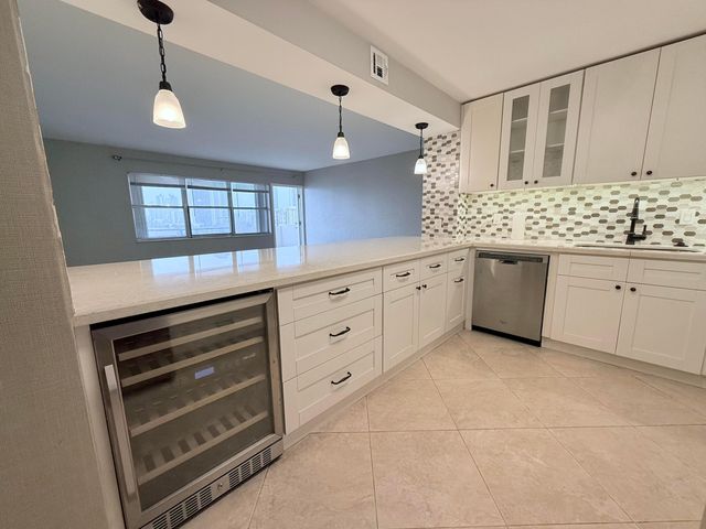 401 Golden Isles Drive, Hallandale Beach, FL 33009