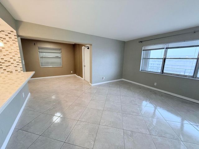 401 Golden Isles Drive, Hallandale Beach, FL 33009