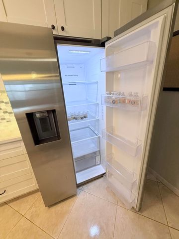 401 Golden Isles Drive, Hallandale Beach, FL 33009