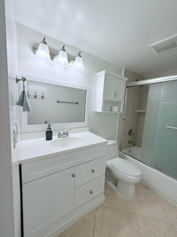 401 Golden Isles Drive, Hallandale Beach, FL 33009