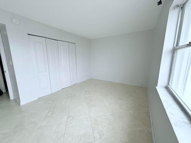 401 Golden Isles Drive, Hallandale Beach, FL 33009