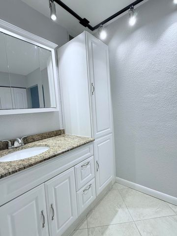 401 Golden Isles Drive, Hallandale Beach, FL 33009