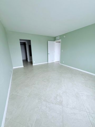 401 Golden Isles Drive, Hallandale Beach, FL 33009