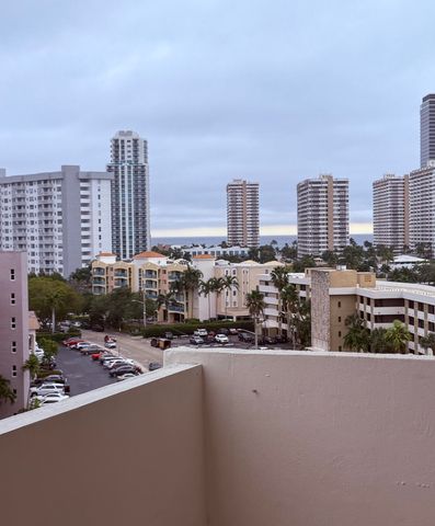 401 Golden Isles Drive, Hallandale Beach, FL 33009