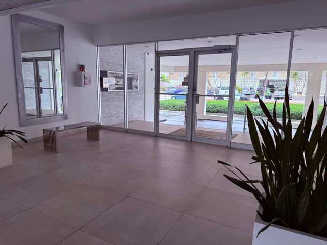 401 Golden Isles Drive, Hallandale Beach, FL 33009