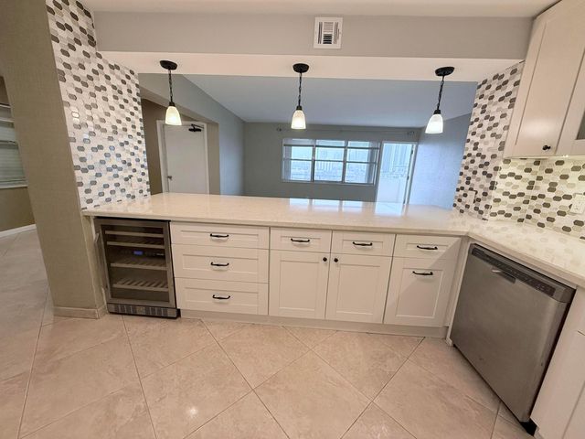 401 Golden Isles Drive, Hallandale Beach, FL 33009