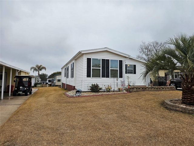 1706 PEBBLE BEACH LANE, Lady Lake, FL 32159