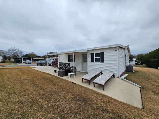 1706 PEBBLE BEACH LANE, Lady Lake, FL 32159