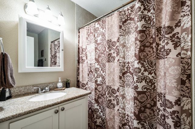 1041 Magnolia Point Drive, Huffman, TX 77336