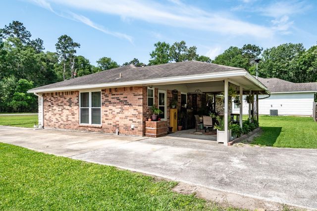 1041 Magnolia Point Drive, Huffman, TX 77336