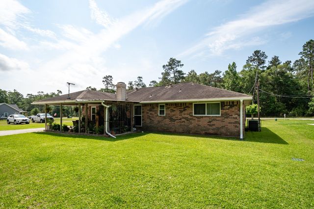 1041 Magnolia Point Drive, Huffman, TX 77336