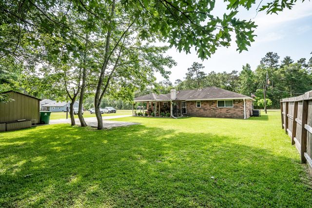 1041 Magnolia Point Drive, Huffman, TX 77336