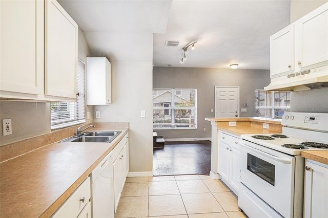 7708 N RIVERDALE AVENUE, Tampa, FL 33604