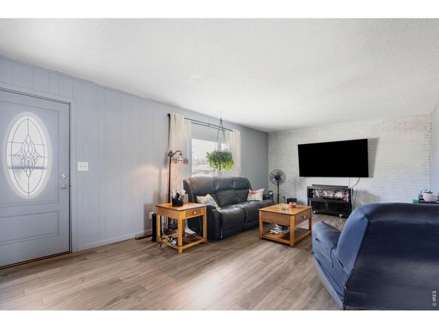 110 Ash St, Log Lane Village, CO 80705