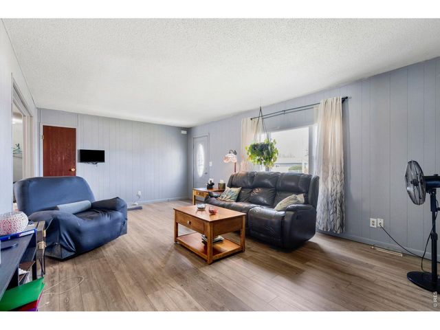 110 Ash St, Log Lane Village, CO 80705