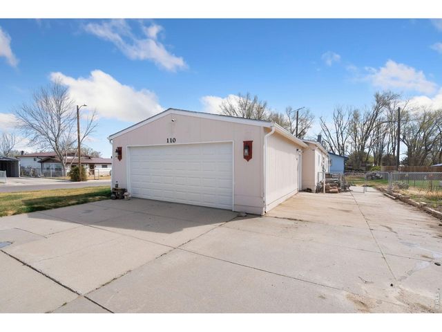 110 Ash St, Log Lane Village, CO 80705