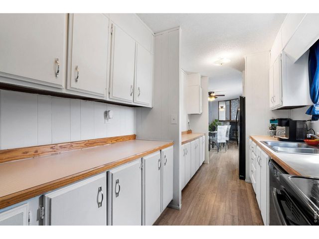 110 Ash St, Log Lane Village, CO 80705